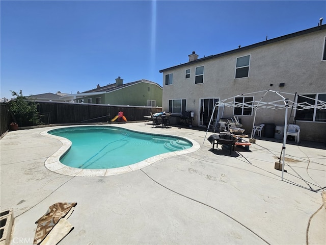 12912 Newport St, Hesperia, CA 92344 - view of pool with a patio and a fenced backyard