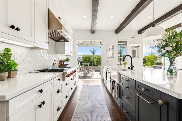 101 Via Almodovar, San Clemente, CA 92672 - kitchen with under cabinet range hood, a sink, white cabinets, stainless steel gas cooktop, and beam ceiling