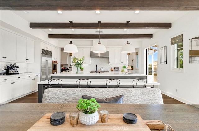 101 Via Almodovar, San Clemente, CA 92672 - dining area with dark wood-style flooring, recessed lighting, baseboards, and beam ceiling