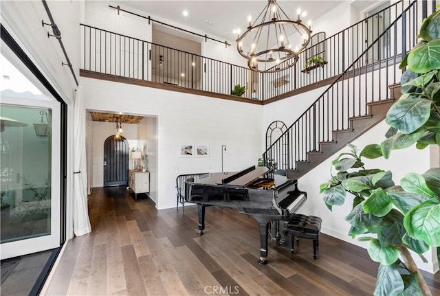 101 Via Almodovar, San Clemente, CA 92672 - entryway featuring a high ceiling, wood finished floors, a chandelier, stairway, and recessed lighting