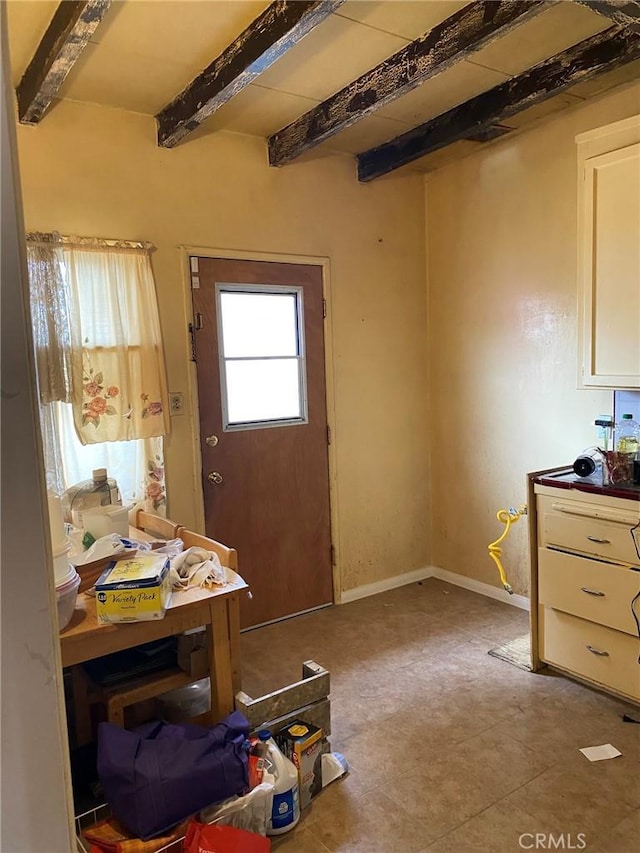 1713 W 165th St, Compton, CA 90220 - miscellaneous room featuring beam ceiling and baseboards