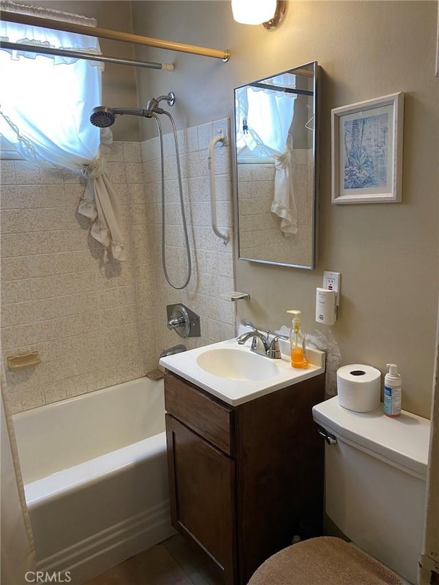 1713 W 165th St, Compton, CA 90220 - bathroom featuring toilet, vanity, and tub / shower combination