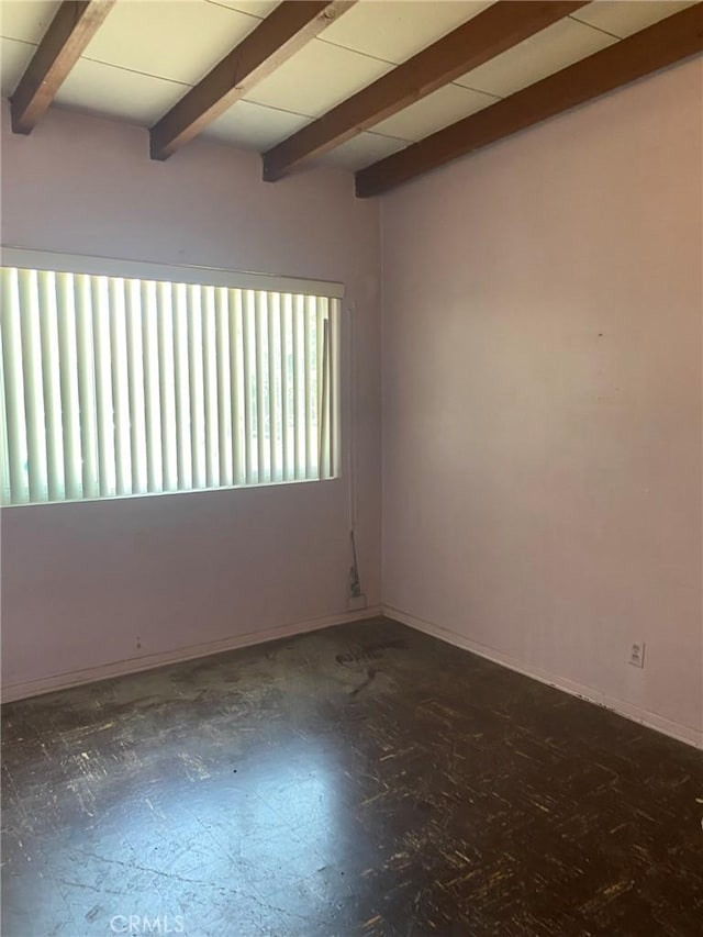 1713 W 165th St, Compton, CA 90220 - spare room featuring beamed ceiling and baseboards