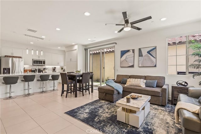 80281 Redstone Way, La Quinta, CA 92253 - living area with ceiling fan, recessed lighting, and light tile patterned flooring