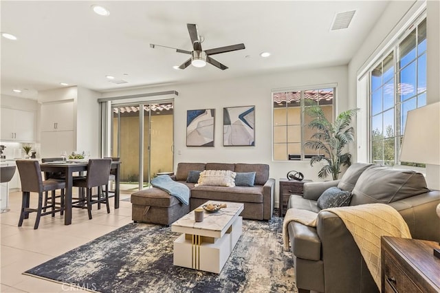 80281 Redstone Way, La Quinta, CA 92253 - living room featuring a ceiling fan, recessed lighting, and light tile patterned floors