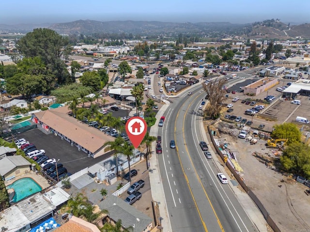 9742 Los Coches Rd, Lakeside, CA 92040 - aerial view of property's location with a mountainous background and a major roadway
