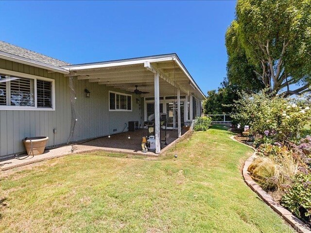 1051 La Reina, San Marcos, CA 92078 - view of yard featuring ceiling fan, a patio area, and cooling unit