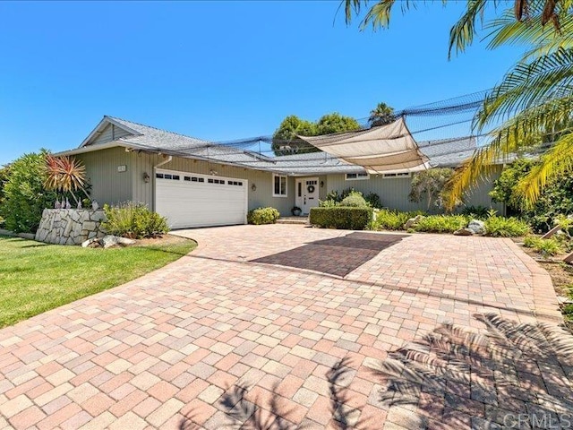 1051 La Reina, San Marcos, CA 92078 - single story home featuring a garage and decorative driveway
