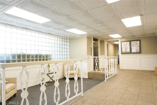 570 W Stocker St Unit 202, Glendale, CA 91202 - empty room featuring wainscoting and a decorative wall