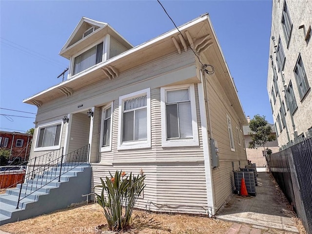 1051 W 18th St, Los Angeles, CA 90015 - view of front of home featuring central air condition unit