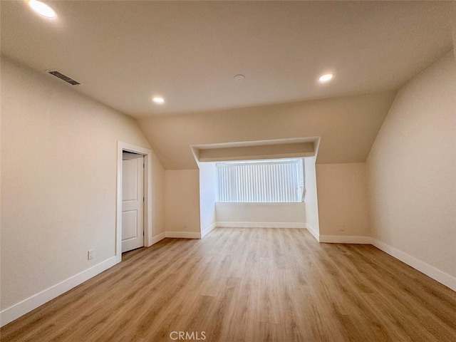 1051 W 18th St, Los Angeles, CA 90015 - bonus room with lofted ceiling, recessed lighting, wood finished floors, and baseboards