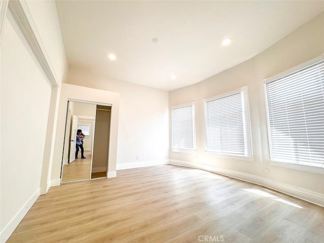 1051 W 18th St, Los Angeles, CA 90015 - unfurnished room with light wood finished floors, baseboards, and recessed lighting