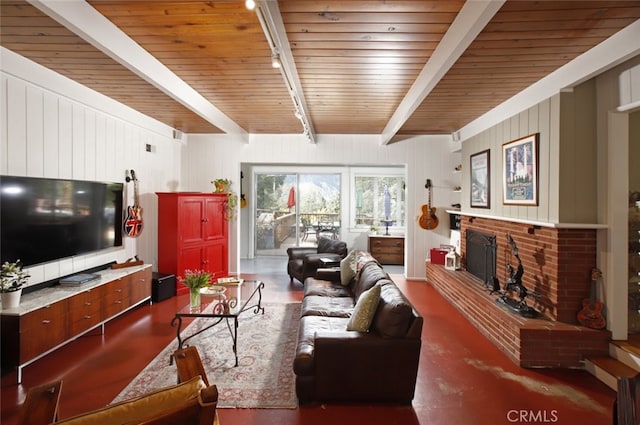 7235 Estepa Dr, Tujunga, CA 91042 - living area featuring a brick fireplace, track lighting, and wood ceiling with exposed beams