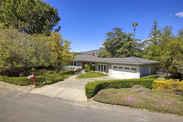 7235 Estepa Dr, Tujunga, CA 91042 - single story home featuring an attached garage and concrete driveway