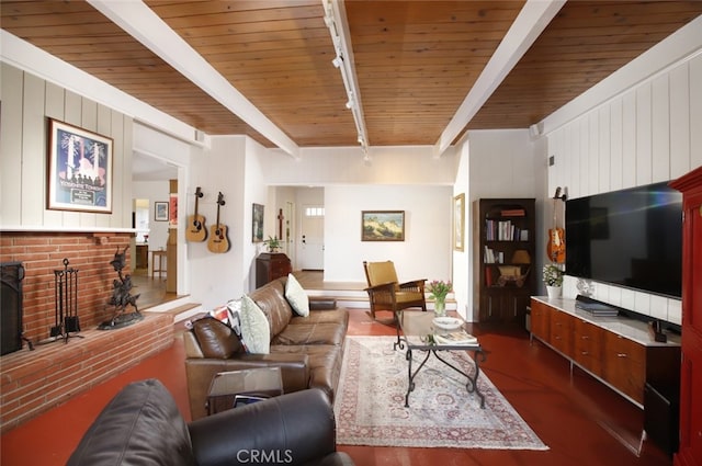 7235 Estepa Dr, Tujunga, CA 91042 - living room with rail lighting, wood ceiling with exposed beams, and dark wood finished floors
