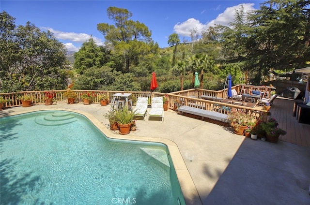 7235 Estepa Dr, Tujunga, CA 91042 - view of pool featuring a wooden deck and a patio area