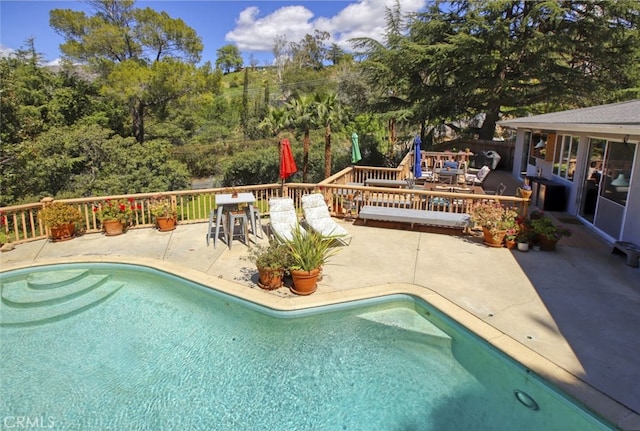 7235 Estepa Dr, Tujunga, CA 91042 - view of pool featuring a wooden deck, outdoor dining space, and a patio