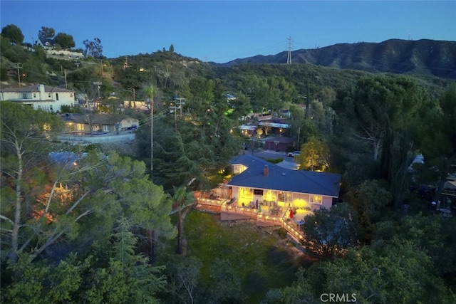 7235 Estepa Dr, Tujunga, CA 91042 - aerial view of property and surrounding area featuring a mountain backdrop and a forest