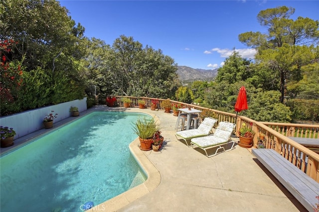 7235 Estepa Dr, Tujunga, CA 91042 - view of pool with a deck with mountain view