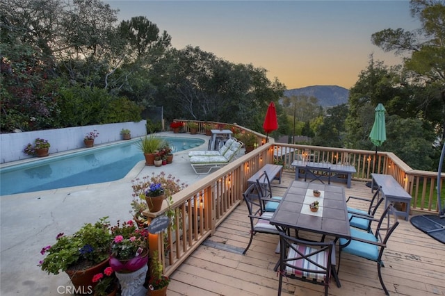 7235 Estepa Dr, Tujunga, CA 91042 - deck with outdoor dining area and a mountain view