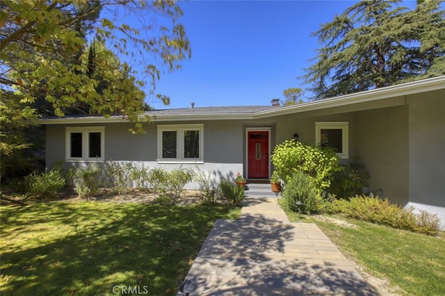 7235 Estepa Dr, Tujunga, CA 91042 - view of front of property featuring stucco siding and a front yard