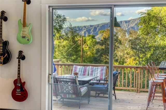 7235 Estepa Dr, Tujunga, CA 91042 - doorway featuring wood finished floors and a mountain view