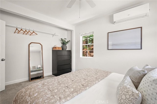 1108 Stanford Ave, Redondo Beach, CA 90278 - carpeted bedroom with a wall mounted air conditioner, baseboards, a ceiling fan, and arched walkways