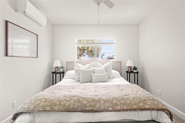 1108 Stanford Ave, Redondo Beach, CA 90278 - bedroom with a wall unit AC, baseboards, and ceiling fan