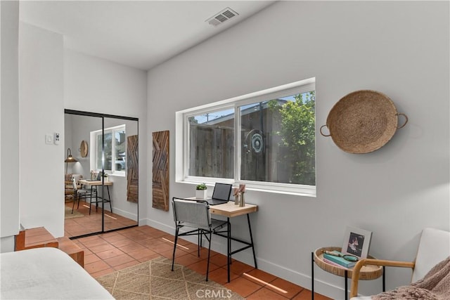 1848 Lave Ave, Long Beach, CA 90815 - bedroom with multiple windows, tile patterned floors, and an office area