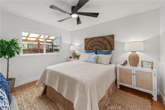 1848 Lave Ave, Long Beach, CA 90815 - bedroom featuring baseboards, wood finished floors, and ceiling fan