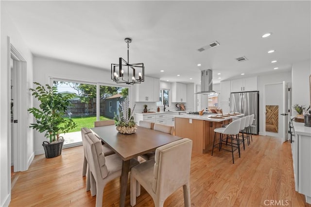 1848 Lave Ave, Long Beach, CA 90815 - dining space with a chandelier, light wood finished floors, and recessed lighting