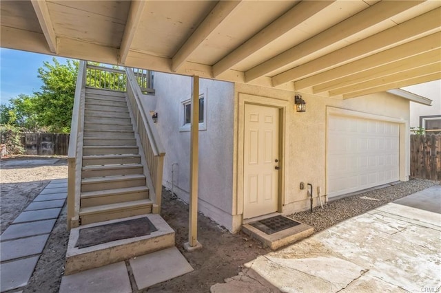 390 E 4th St, San Bernardino, CA 92410 - entrance to property with a garage and stucco siding