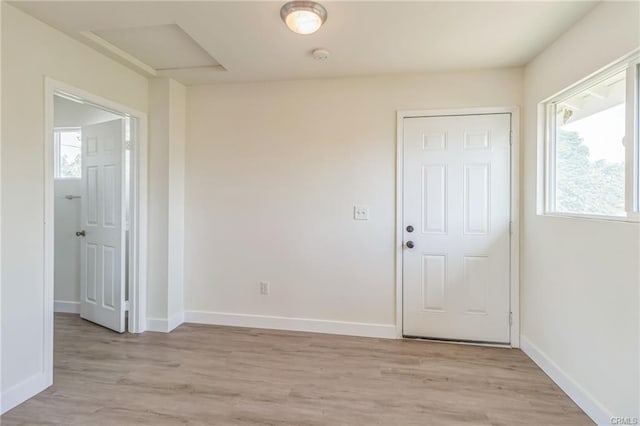 390 E 4th St, San Bernardino, CA 92410 - unfurnished room with light wood-type flooring and baseboards