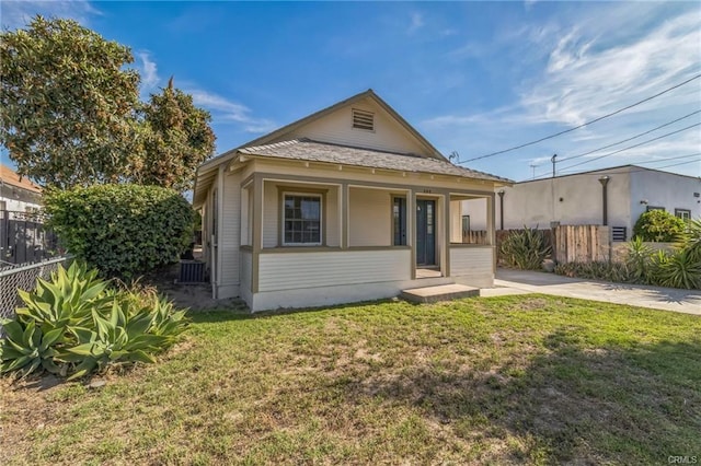 390 E 4th St, San Bernardino, CA 92410 - view of front facade featuring a porch and central AC