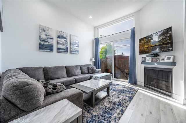 9950 Topanga Canyon Blvd Unit 5, Chatsworth, CA 91311 - living room with a fireplace, wood finished floors, and recessed lighting