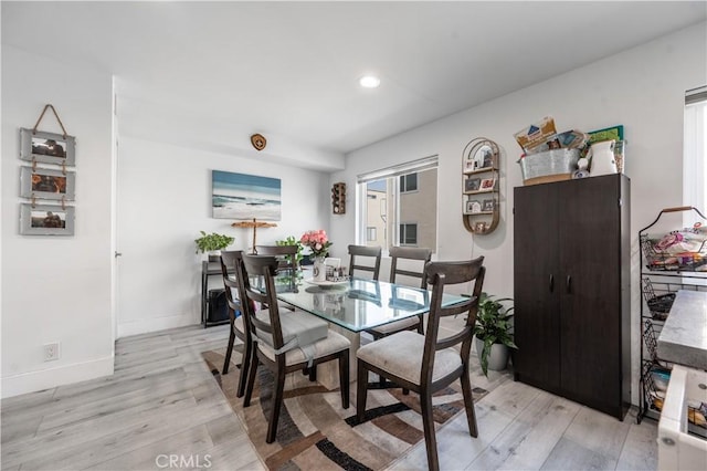 9950 Topanga Canyon Blvd Unit 5, Chatsworth, CA 91311 - dining space with light wood-style floors, recessed lighting, and baseboards