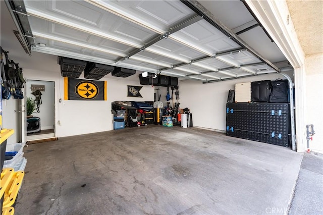9950 Topanga Canyon Blvd Unit 5, Chatsworth, CA 91311 - garage with a garage door opener