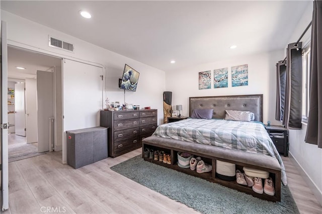 9950 Topanga Canyon Blvd Unit 5, Chatsworth, CA 91311 - bedroom with light wood-type flooring and recessed lighting