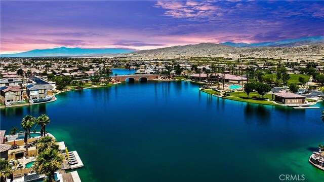 43228 Bacino Ct, Indio, CA 92203 - aerial view at dusk of a water and mountain view and a residential view