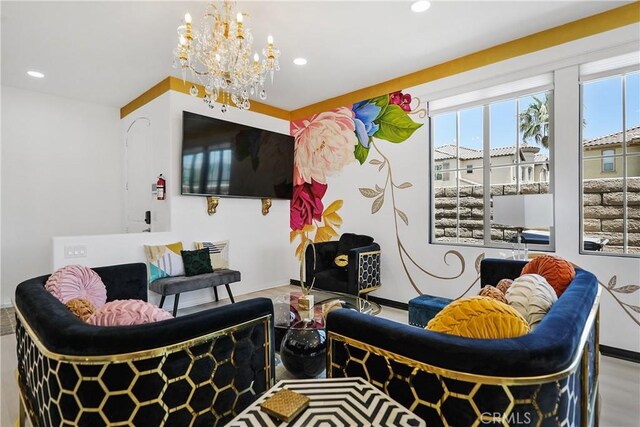43228 Bacino Ct, Indio, CA 92203 - living area featuring a chandelier, recessed lighting, and baseboards