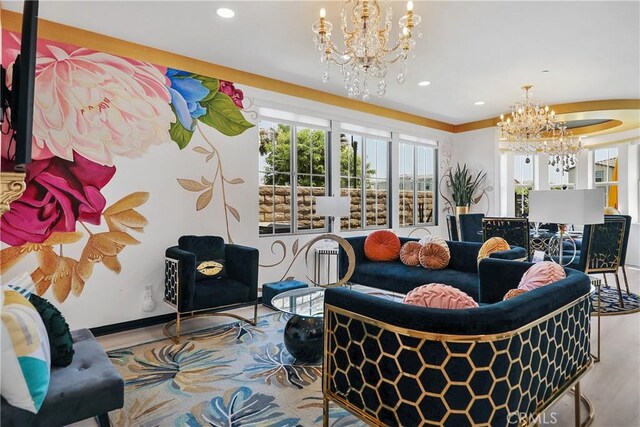 43228 Bacino Ct, Indio, CA 92203 - living area with a chandelier, wood finished floors, recessed lighting, and baseboards