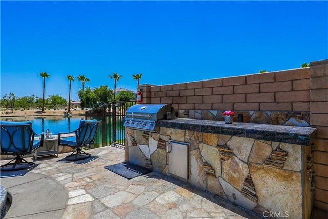 43228 Bacino Ct, Indio, CA 92203 - view of patio / terrace with a pool