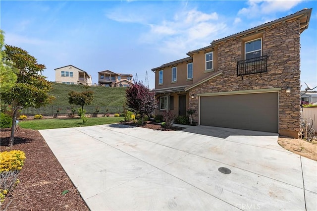 29015 Ridgecrest Ct, Valencia, CA 91354 - view of front of house featuring stone siding, concrete driveway, a garage, stucco siding, and a tile roof