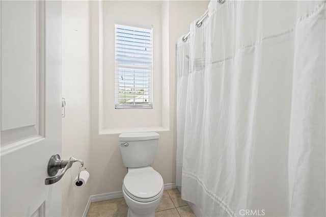 29015 Ridgecrest Ct, Valencia, CA 91354 - bathroom featuring toilet, baseboards, tile patterned flooring, and a shower with shower curtain