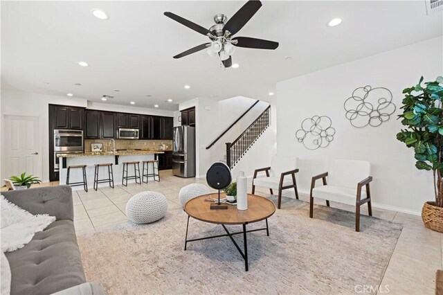 29015 Ridgecrest Ct, Valencia, CA 91354 - living room with light tile patterned floors, stairs, recessed lighting, and a ceiling fan