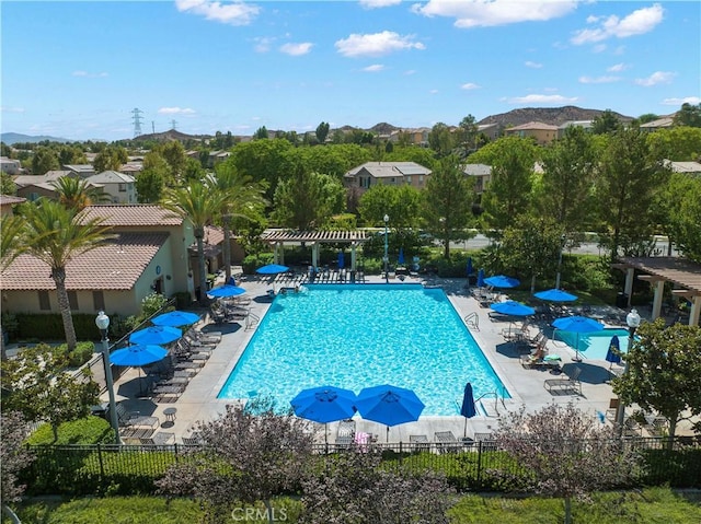 29015 Ridgecrest Ct, Valencia, CA 91354 - community pool with a pergola, a patio area, and a residential view