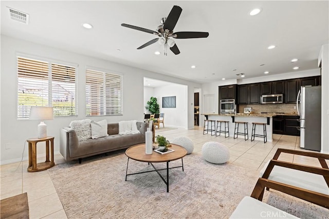 29015 Ridgecrest Ct, Valencia, CA 91354 - living area featuring light tile patterned floors, recessed lighting, ceiling fan, and baseboards