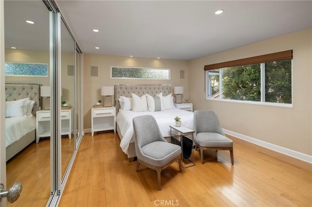 16561 Wanderer Ln, Huntington Beach, CA 92649 - bedroom with baseboards, light wood finished floors, and recessed lighting