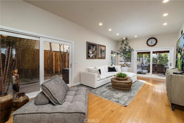 16561 Wanderer Ln, Huntington Beach, CA 92649 - living room featuring recessed lighting and wood finished floors