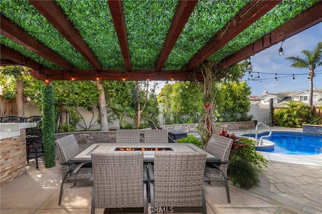 16561 Wanderer Ln, Huntington Beach, CA 92649 - fenced backyard with a fire pit and a patio area